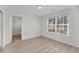 Bright bedroom with hardwood floors and window at 1042 Planters Pl, Mount Pleasant, SC 29464