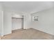 Neutral carpeted bedroom with window and closet featuring sliding doors at 1042 Planters Pl, Mount Pleasant, SC 29464