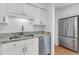 Renovated kitchen with stainless steel appliances and granite countertops at 1042 Planters Pl, Mount Pleasant, SC 29464