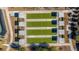 Overhead view of green lawn bowling area with multiple lanes and covered seating at 106 Sea Lavender Ln, Summerville, SC 29486
