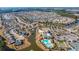 Expansive aerial view of the community featuring ponds, lush greenery, and beautiful single-Gathering homes at 106 Sea Lavender Ln, Summerville, SC 29486
