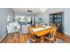 Open concept dining room and living room with plenty of natural light at 106 Sea Lavender Ln, Summerville, SC 29486