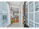 Inviting entryway featuring neutral tones, tiled floors, and views into the open-concept living space at 106 Sea Lavender Ln, Summerville, SC 29486
