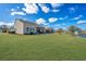 This home boasts a beautiful backyard view of the water feature at 106 Sea Lavender Ln, Summerville, SC 29486