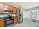 Functional kitchen with stainless steel appliances, granite countertops, eat-in dining, and bright natural light at 106 Sea Lavender Ln, Summerville, SC 29486