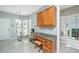 Cozy eat-in kitchen area featuring a breakfast nook, corner windows, and built in desk at 106 Sea Lavender Ln, Summerville, SC 29486