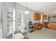 Bright kitchen area with stainless appliances and adjacent breakfast table with outside view at 106 Sea Lavender Ln, Summerville, SC 29486