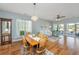 Cozy living room featuring hardwood floors, modern furniture and a glass door to access outdoor space at 106 Sea Lavender Ln, Summerville, SC 29486