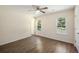 Spacious bedroom featuring hardwood floors, a ceiling fan and lots of natural light at 107 Ranworth Ln, Summerville, SC 29485
