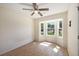 Cozy bedroom featuring hardwood floors, a ceiling fan and a bay window at 107 Ranworth Ln, Summerville, SC 29485