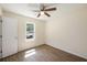 Simple bedroom featuring hardwood floors, a ceiling fan and natural light at 107 Ranworth Ln, Summerville, SC 29485