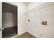 Empty laundry room with washer and dryer hookups and wire shelving at 107 Ranworth Ln, Summerville, SC 29485