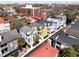 Aerial view of colorful homes in the neighborhood with Charleston bridge in the background at 108 Smith St # 108-C, Charleston, SC 29403