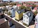 Aerial view of colorful neighborhood homes with Charleston bridge in the background at 108 Smith St # 108-C, Charleston, SC 29403