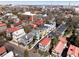 Aerial view of colorful homes in the neighborhood with Charleston bridge in the background at 108 Smith St # 108-C, Charleston, SC 29403