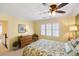 Bedroom featuring a ceiling fan, neutral carpet, and a comfortable bed with floral patterned comforter at 108 Smith St # 108-C, Charleston, SC 29403