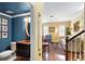 A living room and powder room combination, highlighting modern fixtures and warm, inviting colors at 108 Smith St # 108-C, Charleston, SC 29403