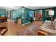 Inviting living room featuring hardwood floors, stylish decor, and a mounted flatscreen television at 110 Dunbury Dr, Summerville, SC 29485