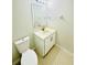 Bathroom featuring a vanity with mirror, a toilet, and tile flooring at 112 Mansfield Blvd, North Charleston, SC 29418