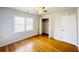 Bedroom with a window, ceiling fan, and spacious closet at 112 Mansfield Blvd, North Charleston, SC 29418
