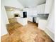 Open-concept kitchen with granite countertops, stainless steel appliances, and view to living room at 112 Mansfield Blvd, North Charleston, SC 29418