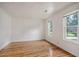 Clean, bright bedroom with hardwood floors and plenty of natural light at 112 Pine Grove Dr, North Charleston, SC 29420