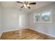 Bedroom with ceiling fan, a view, and a doorway at 112 Pine Grove Dr, North Charleston, SC 29420