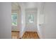 Bright entryway with hardwood floors and a decorative glass front door at 112 Pine Grove Dr, North Charleston, SC 29420