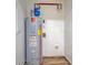 Hot water tank in the utility room with wood-look floors at 112 Pine Grove Dr, North Charleston, SC 29420