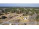 An elevated perspective showcasing a home nestled in a wooded area, highlighting the natural surroundings at 1186 French Santee Rd, Jamestown, SC 29453