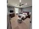 Cozy bedroom with soft carpet, natural light, and ceiling fan at 1186 French Santee Rd, Jamestown, SC 29453