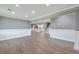 Spacious living room showcasing wood floors, detailed trim, and recessed lighting at 1186 French Santee Rd, Jamestown, SC 29453