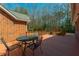 Outdoor deck overlooking wooded backyard providing shade for a quiet space outside at 121 Arrowridge Ct, Summerville, SC 29485