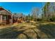 Spacious backyard with a deck, patio and firepit at 121 Arrowridge Ct, Summerville, SC 29485