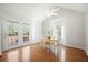 Bright dining area with French doors to deck, vaulted ceiling, and bay window at 121 Arrowridge Ct, Summerville, SC 29485