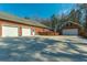 Expansive driveway featuring ample parking space and access to two garages, blending functionality with aesthetic appeal at 121 Arrowridge Ct, Summerville, SC 29485