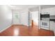 Open-concept kitchen leads to front entry and adjacent rooms with ample cabinet space at 121 Arrowridge Ct, Summerville, SC 29485