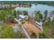 Aerial view of a park with a building, boat storage, path ways and views of the lake in the background at 1368 Clay Field Trl, Summerville, SC 29485