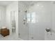 Modern bathroom with a glass-enclosed shower and white subway tile at 1368 Clay Field Trl, Summerville, SC 29485