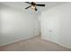 Neutral bedroom features a ceiling fan, carpet floors, and closet for a minimalist design at 1368 Clay Field Trl, Summerville, SC 29485