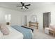 Cozy bedroom featuring a comfortable bed and an open doorway to a walk-in closet at 1368 Clay Field Trl, Summerville, SC 29485