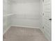 Walk-in closet with wire shelving and neutral carpet at 1368 Clay Field Trl, Summerville, SC 29485