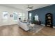 Inviting living room with natural light, blue accent wall, and comfortable seating area at 1368 Clay Field Trl, Summerville, SC 29485