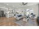 Open-concept living area with a comfortable seating, views into the kitchen, and plenty of natural light at 1368 Clay Field Trl, Summerville, SC 29485