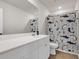 A well-lit bathroom with a shark-themed shower curtain and a spacious vanity at 141 Woodland Oak Way, Summerville, SC 29485