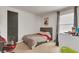 Cozy bedroom with a full size bed, carpeted floor, and a 'Super' poster at 141 Woodland Oak Way, Summerville, SC 29485