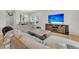 Bright and spacious living room with modern decor, comfortable seating, and natural light, great for Gathering and guests at 141 Woodland Oak Way, Summerville, SC 29485