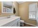 Bright bathroom featuring a white vanity and an updated mirror at 159 Bridgecreek Dr, Goose Creek, SC 29445