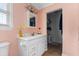 Cozy bathroom with a white vanity, medicine cabinet, and updated fixtures at 159 Bridgecreek Dr, Goose Creek, SC 29445