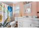 Clean bathroom with a white vanity and colorful shower curtain at 159 Bridgecreek Dr, Goose Creek, SC 29445